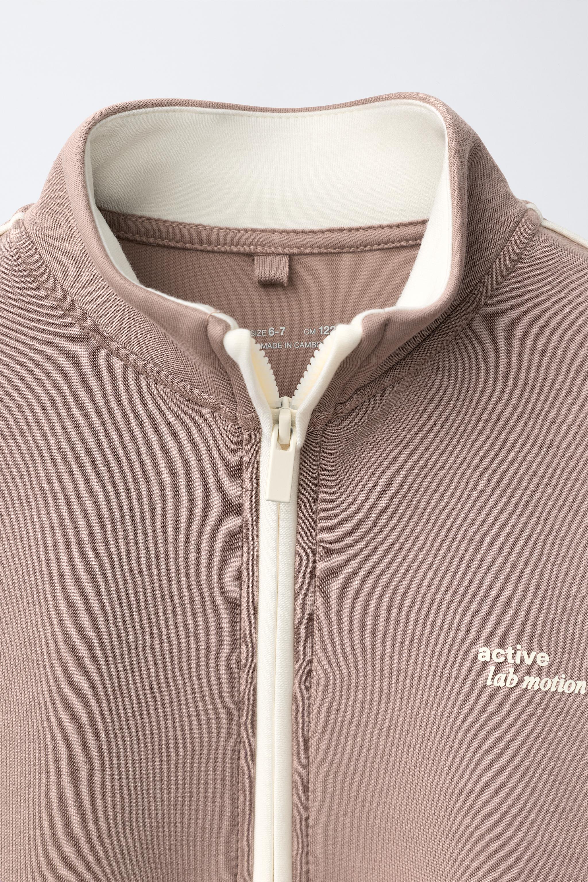 VESTE SPORT À LISERÉ EN CONTRASTE