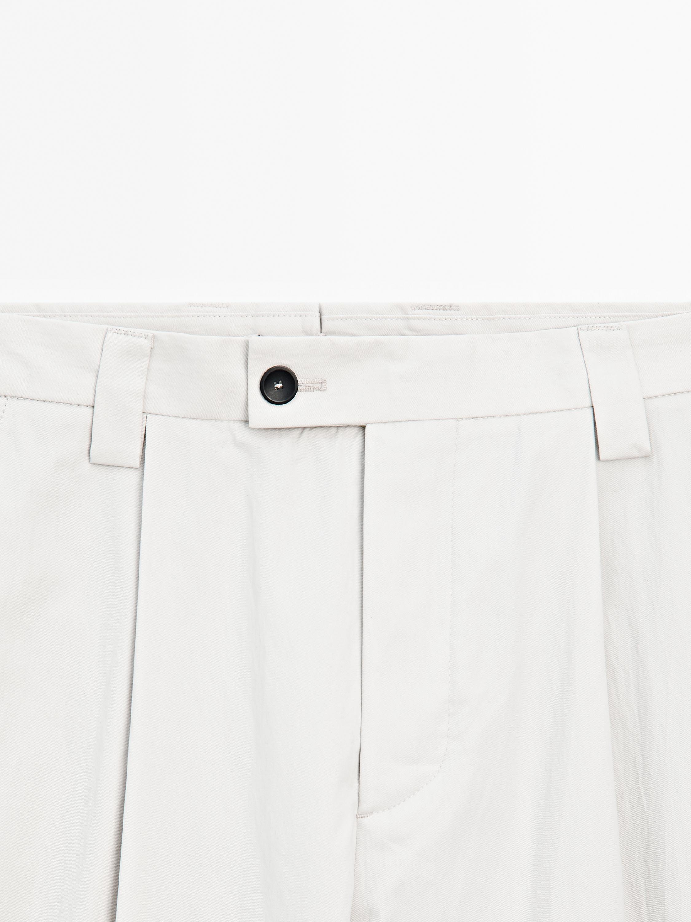Pantalon à pince en crêpe de coton mélangé - Limited Edition