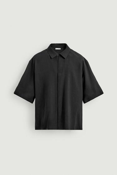 قميص منسدل RELAXED FIT - أسود الخاص بـ Zara