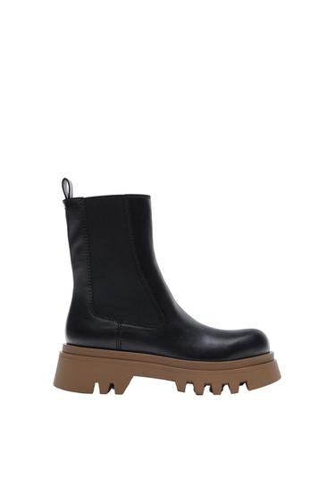 FLAT LEATHER ANKLE BOOTS WITH TRACK SOLES