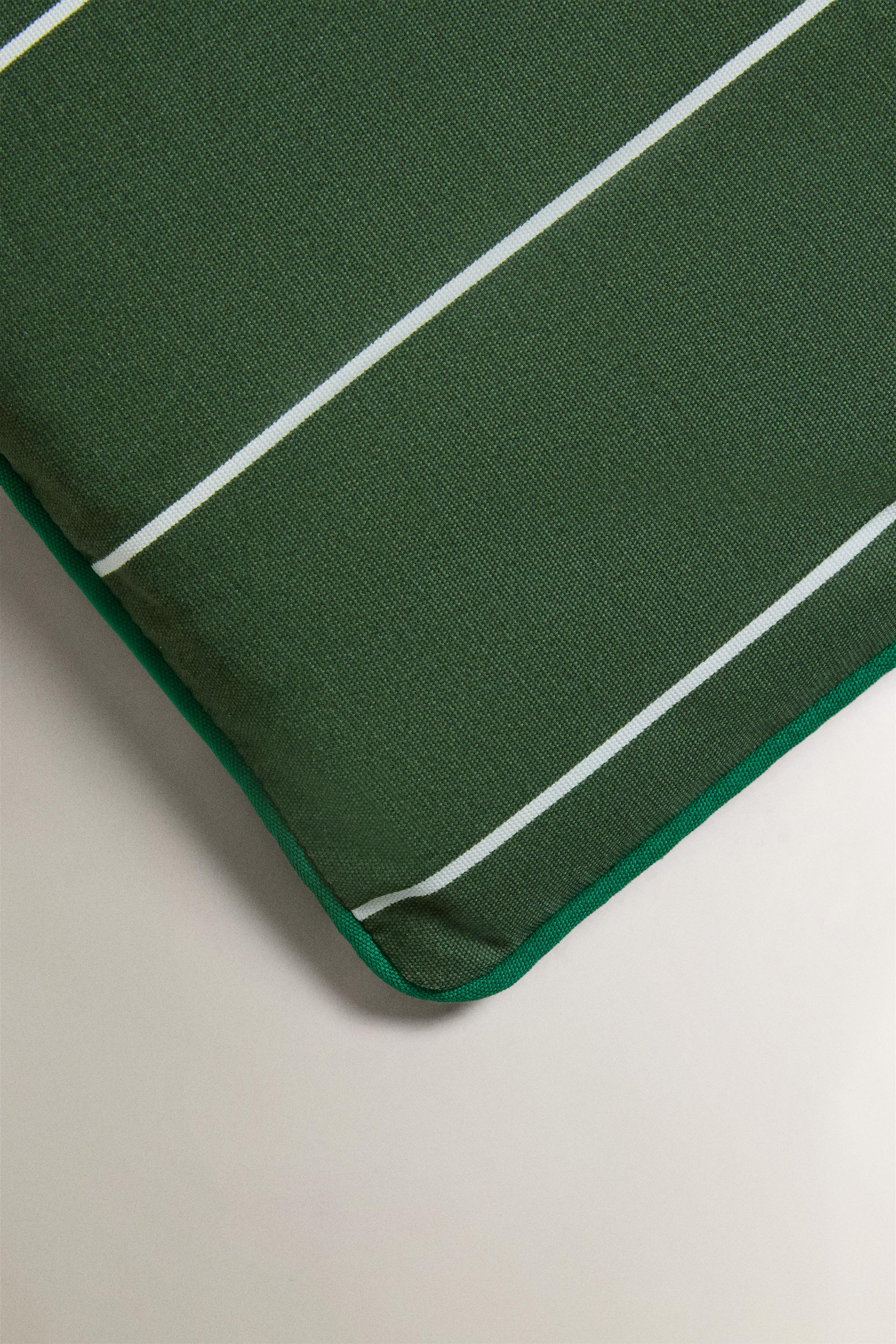 STRIPED TOPPER WITH PIPING