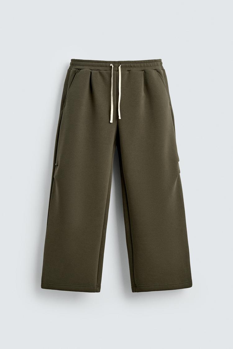 WIDE-LEG NEOPRENE-EFFECT TROUSERS WITH STUDS