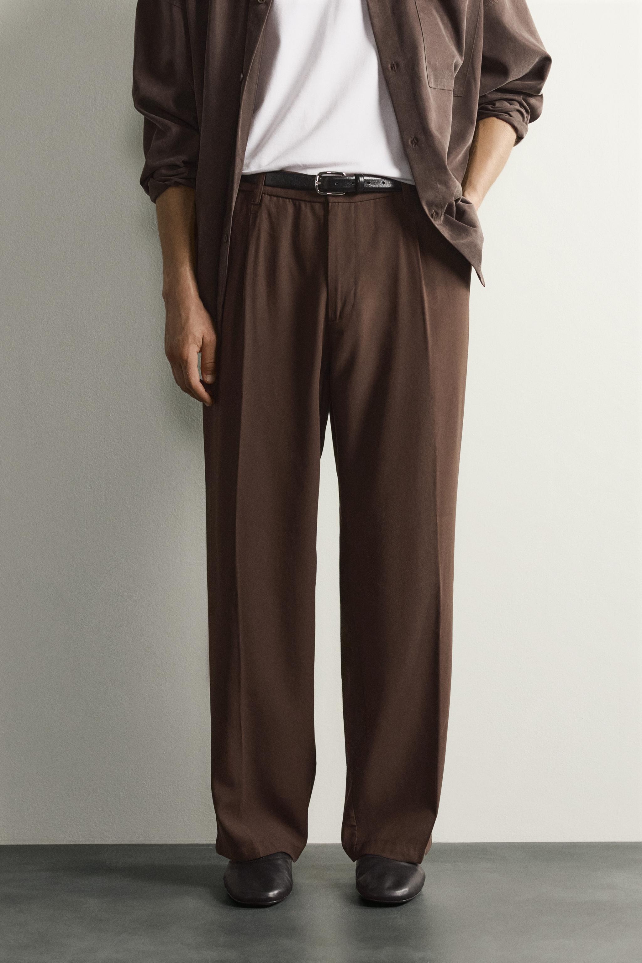 FLOWY RELAXED FIT PLEATED PANTS — Brown