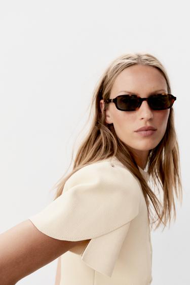 جاكيت محاك بأكمام منفوخة وفتحات - خَام by Zara