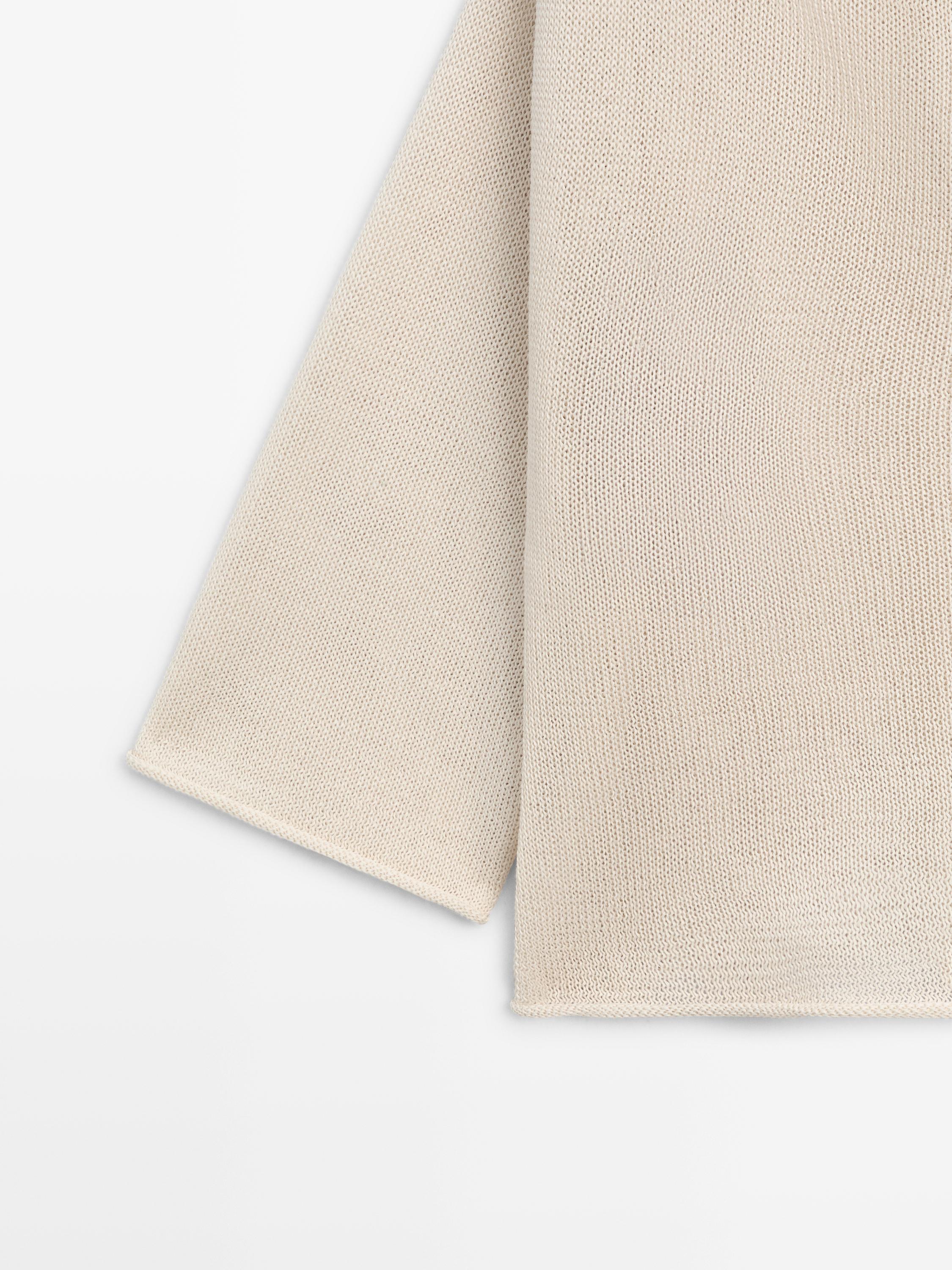 100% cotton knit sweater with back ties