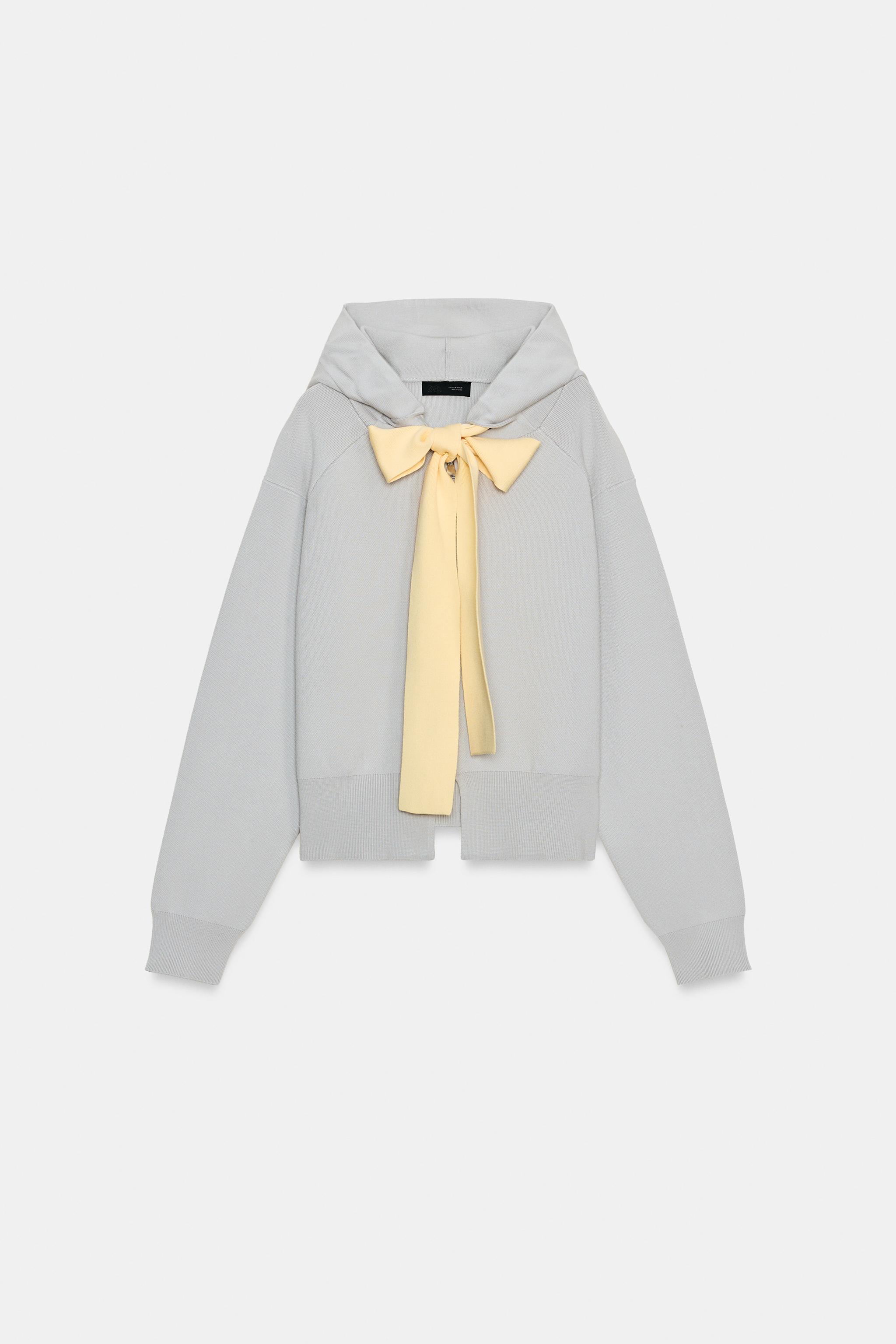 GILET EN MAILLE À CAPUCHE ET LIEN