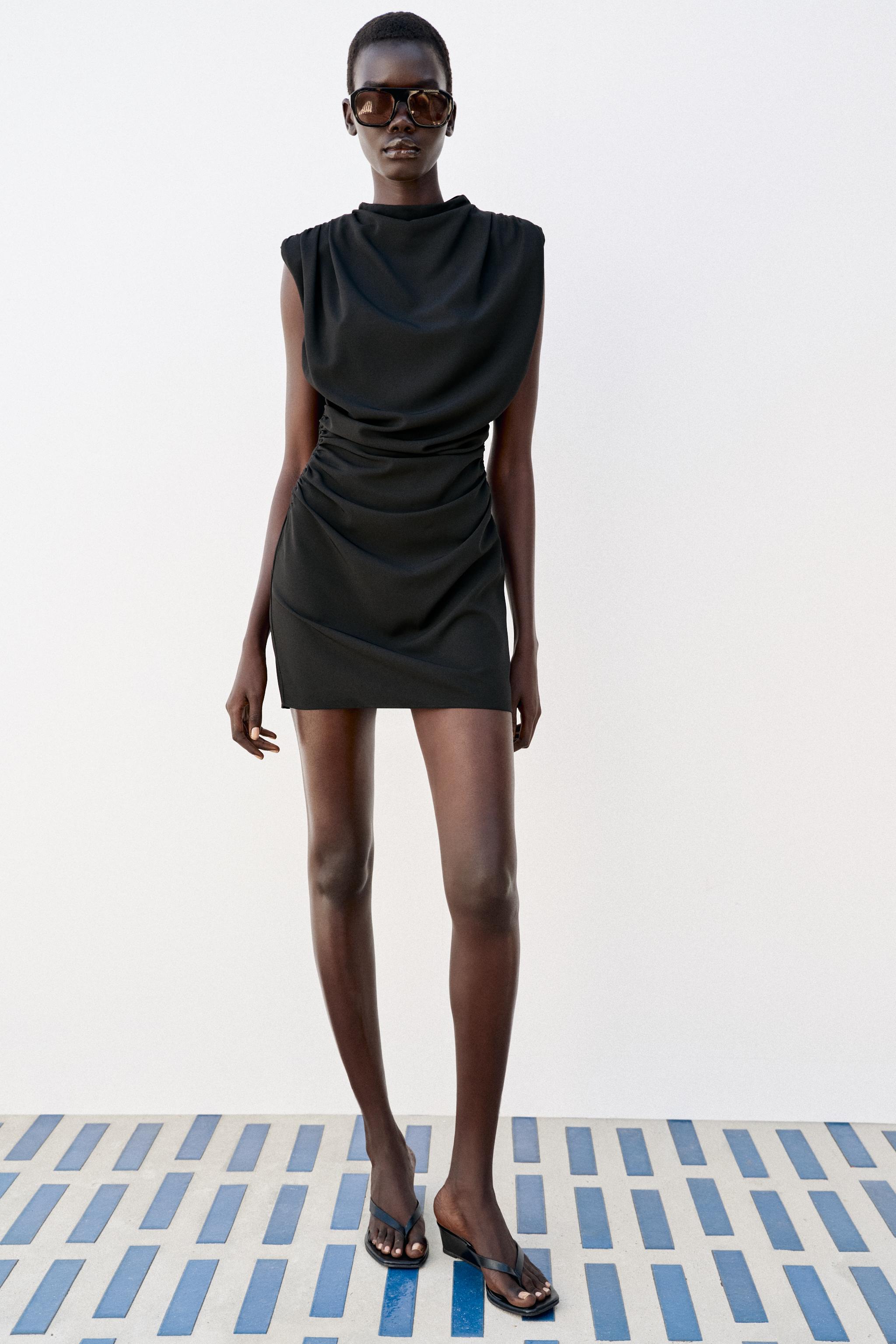 DRAPED MINI DRESS WITH SHOULDER PADS