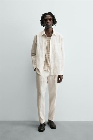 PANTALÓN RELAXED FIT LINO - Blanco de Zara - Imagen 0