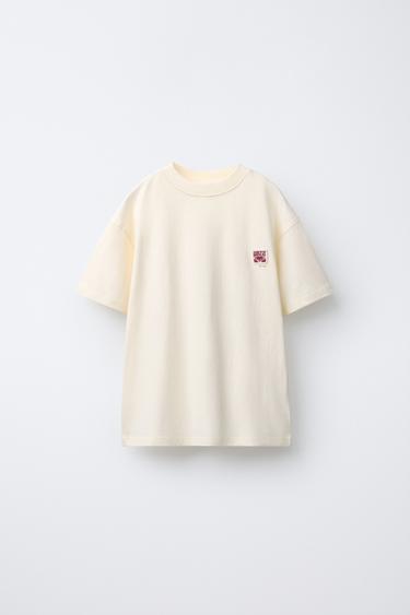 PLAIN T-SHIRT WITH PATCH APPLIQUÉ - White by Zara