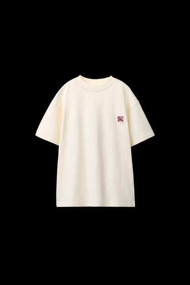 PLAIN T-SHIRT WITH PATCH APPLIQUÉ - White by Zara - Image 0