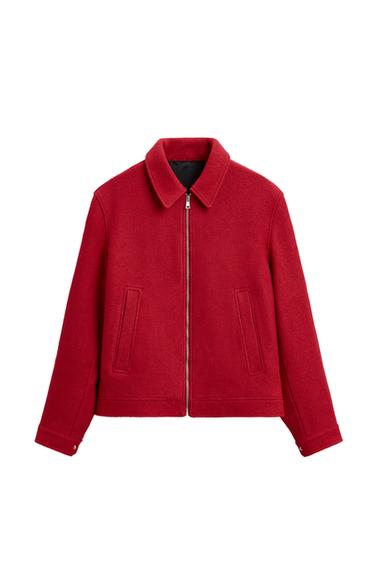 Front view of a red zip-up jacket with side pockets
