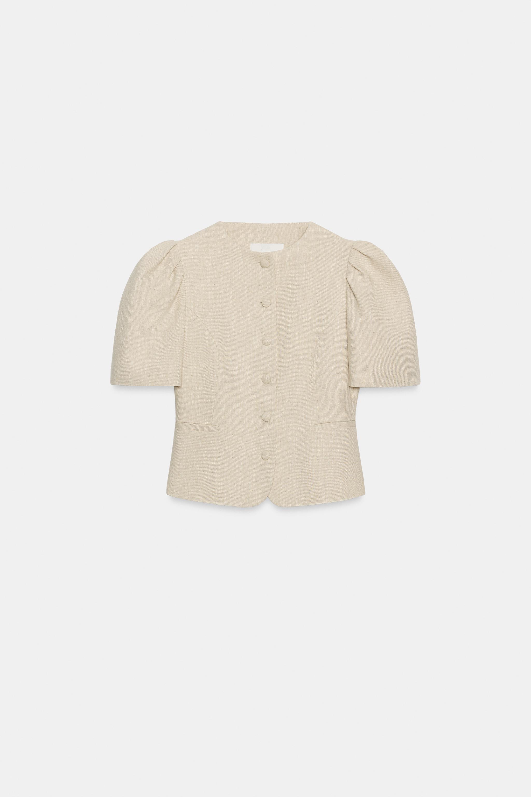 VESTE À MANCHES COURTES BOUFFANTES