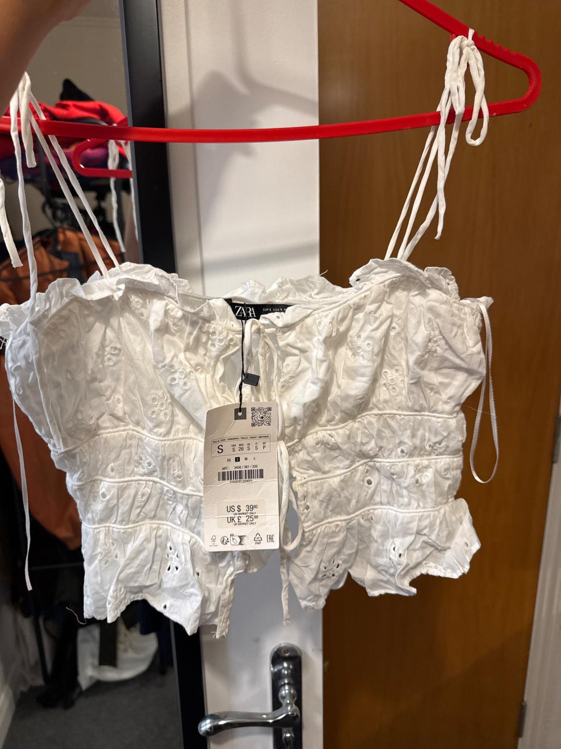 TOP WITH CUTWORK EMBROIDERY AND BOWS - Image 2