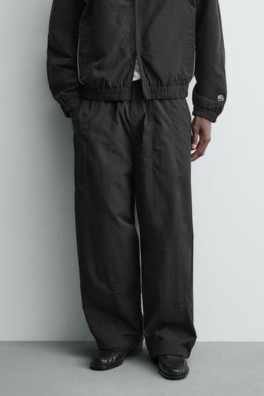 PANTALÓN JOGGER TÉCNICO BANDAS CONTRASTE - Negro de Zara