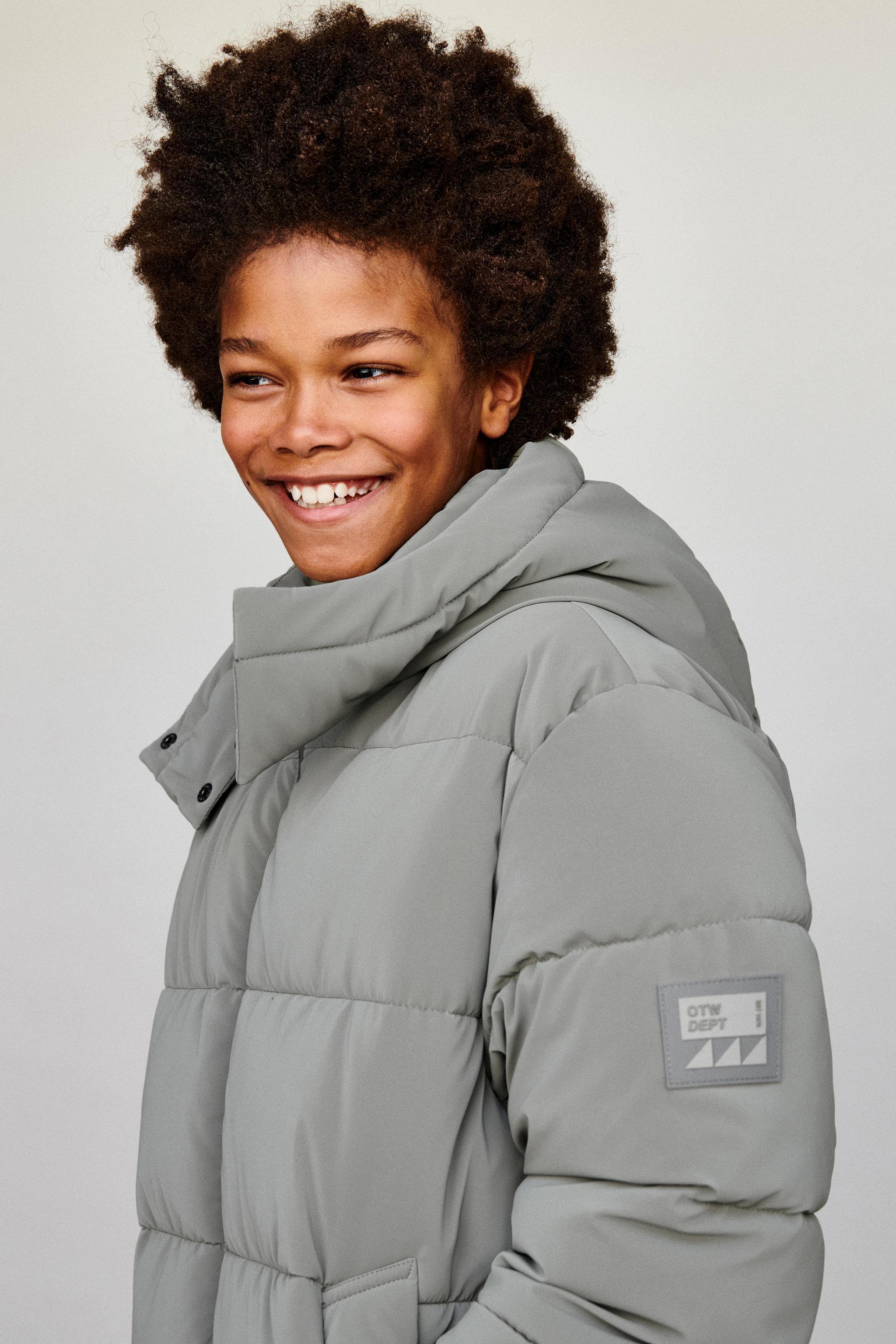 MANTEAU LONG À ÉTIQUETTE GOMMÉE
