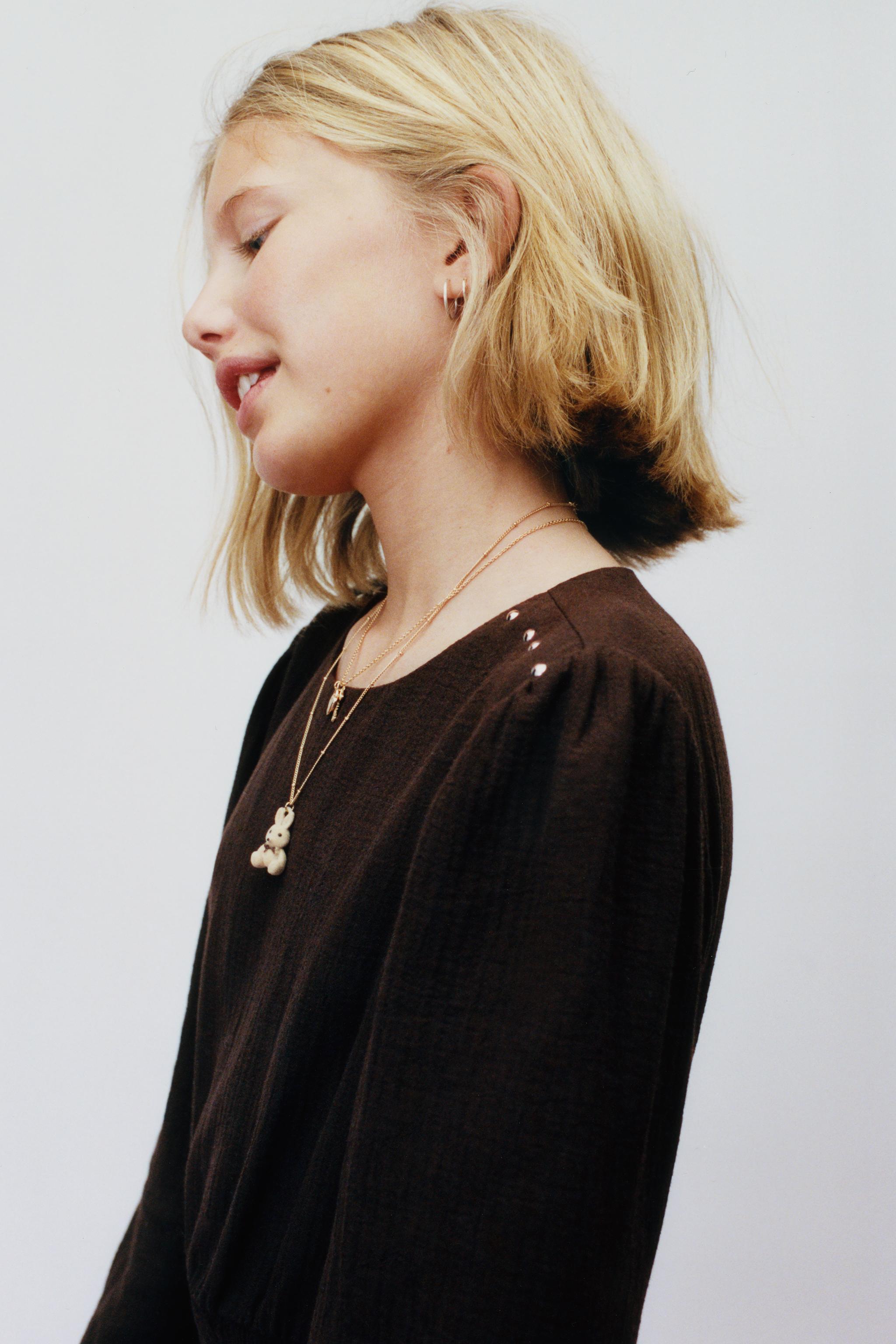 RUFFLED TEXTURED DRESS WITH STUDS