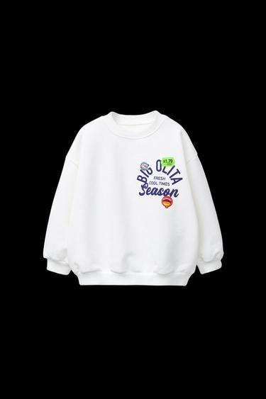 SUDADERA ESTAMPADO Y PARCHES - Blanco de Zara - Imagen 0