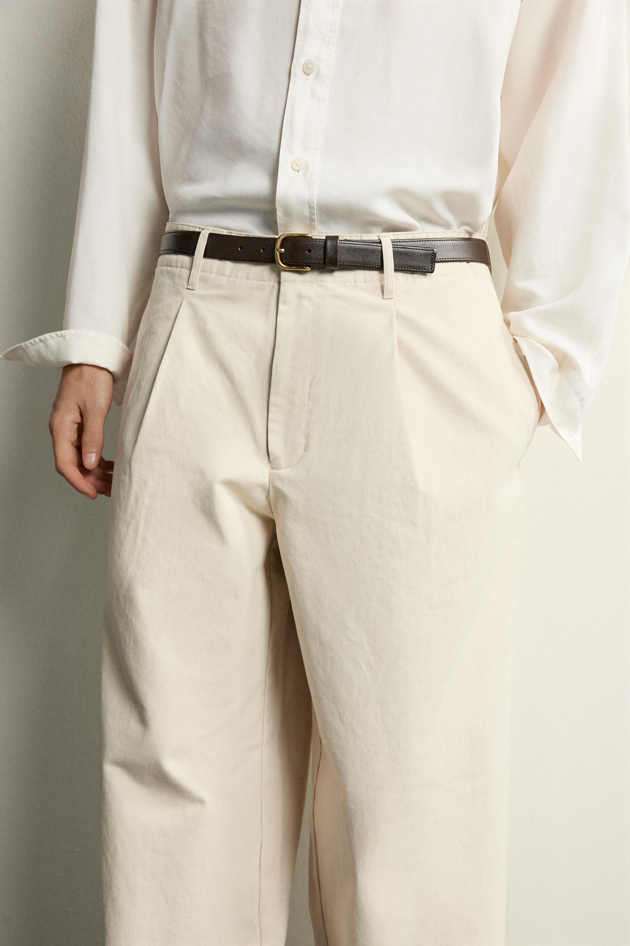 RELAXED FIT PLEATED PANTS