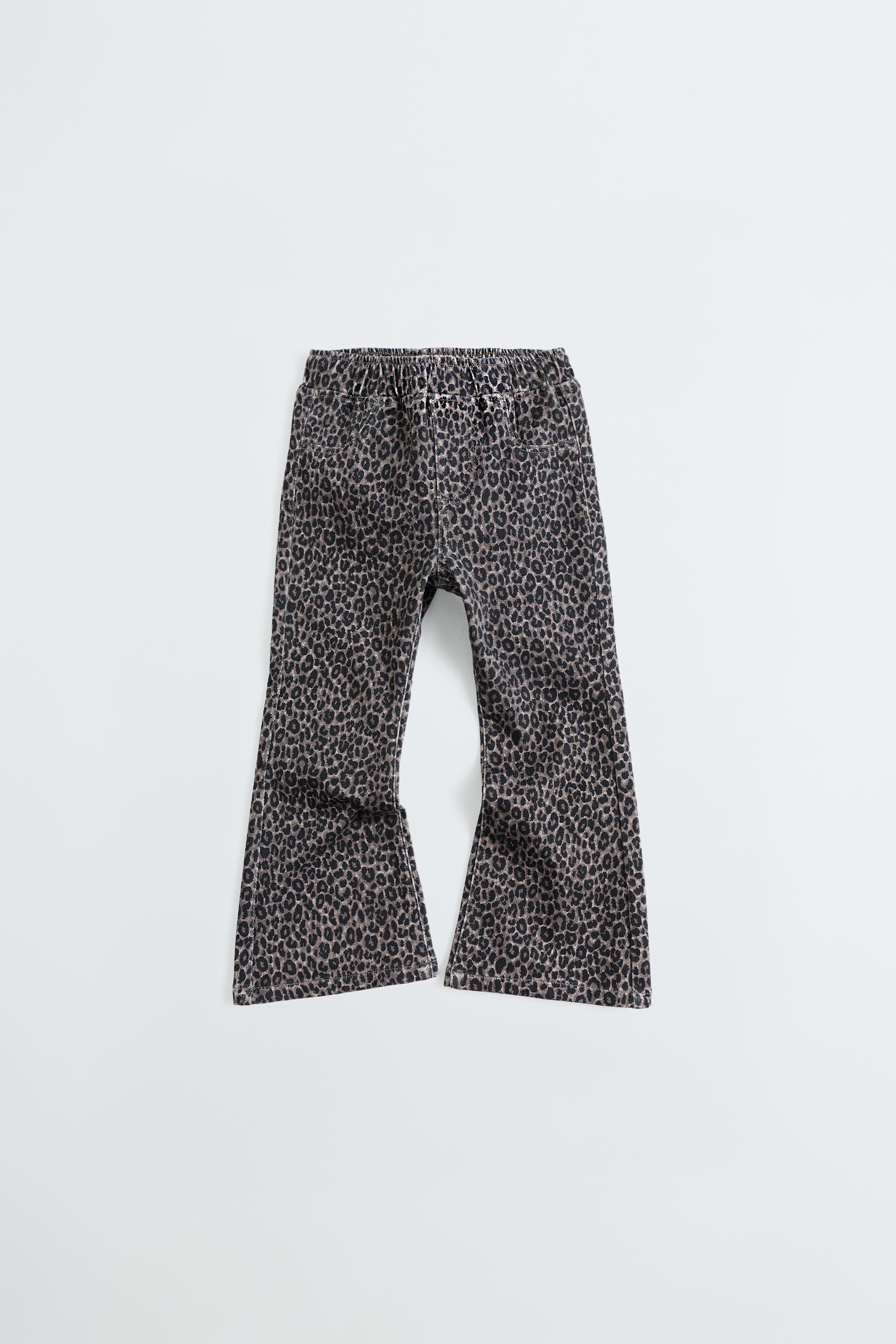 ANIMAL PRINT FLARE JEANS — Black