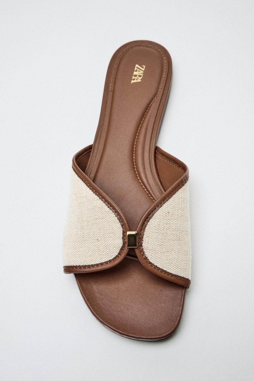 FLAT SANDALS WITH METAL DETAIL