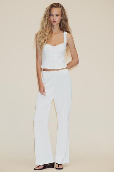 TOP CREPE BOTÓN JOYA - Blanco de Zara