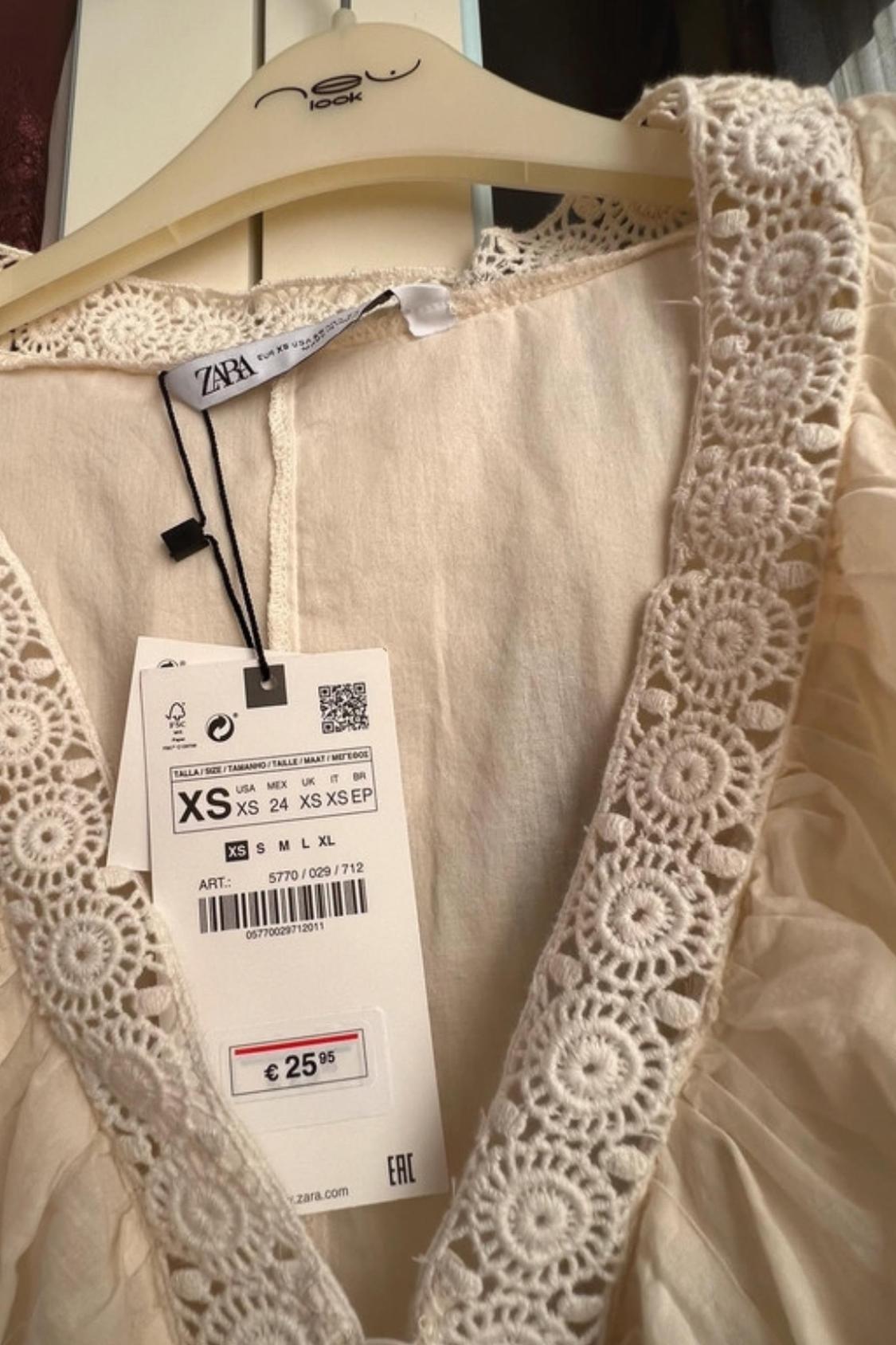 BLUSA NOVA COM ETIQUETABORDADA NO PEITO - Image 3