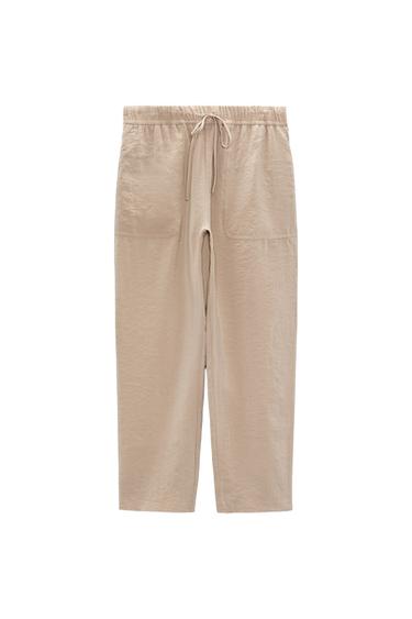 RELAXED TROUSERS