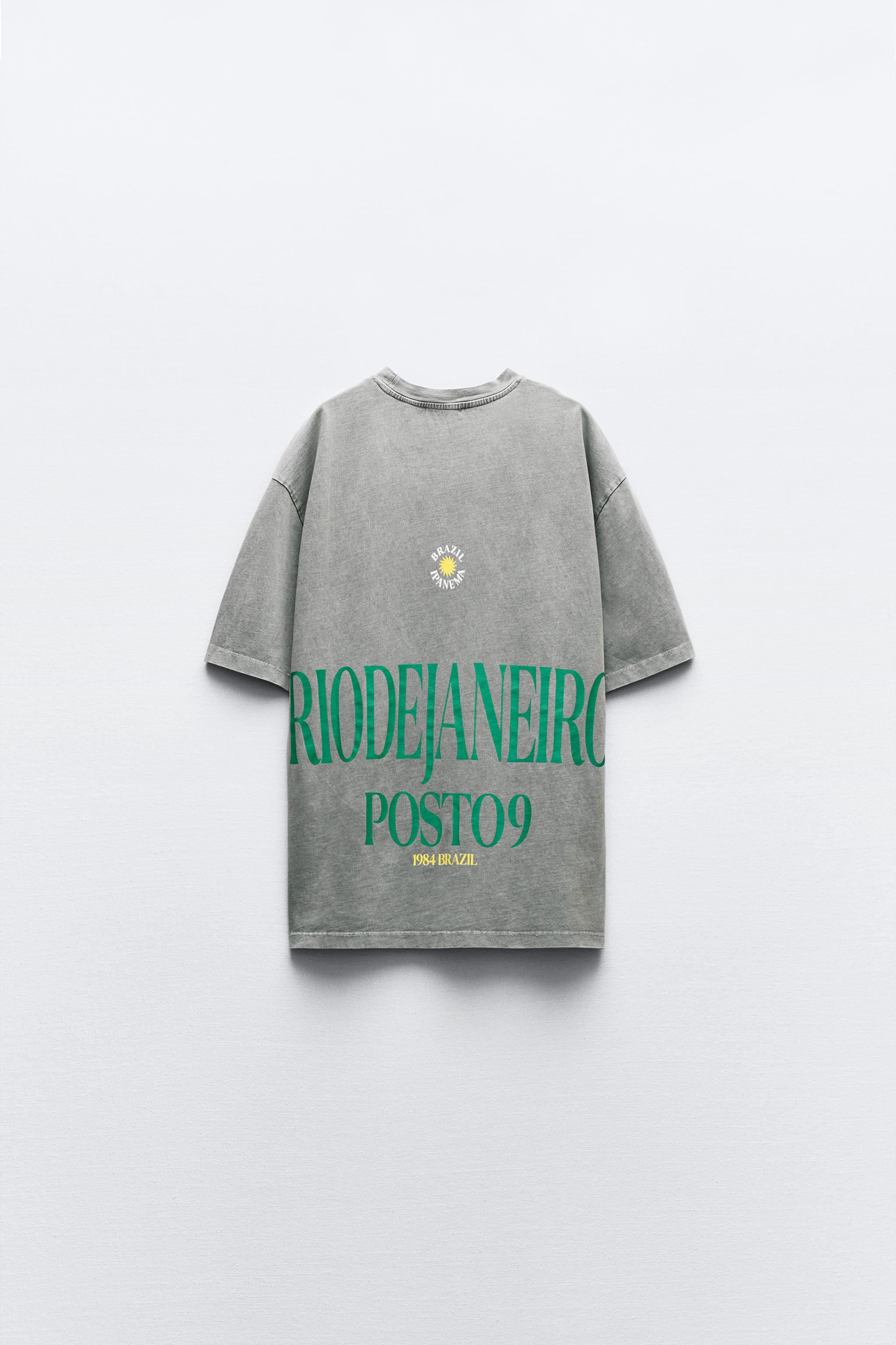 WASHED EFFECT T-SHIRT WITH SLOGAN