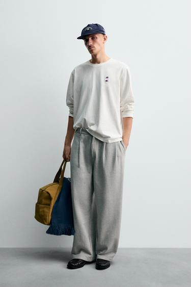 PANTALÓN RELAXED FIT PLIEGUES CHAMPION ® X ZARA - Gris vigoré de Zara - Imagen 0