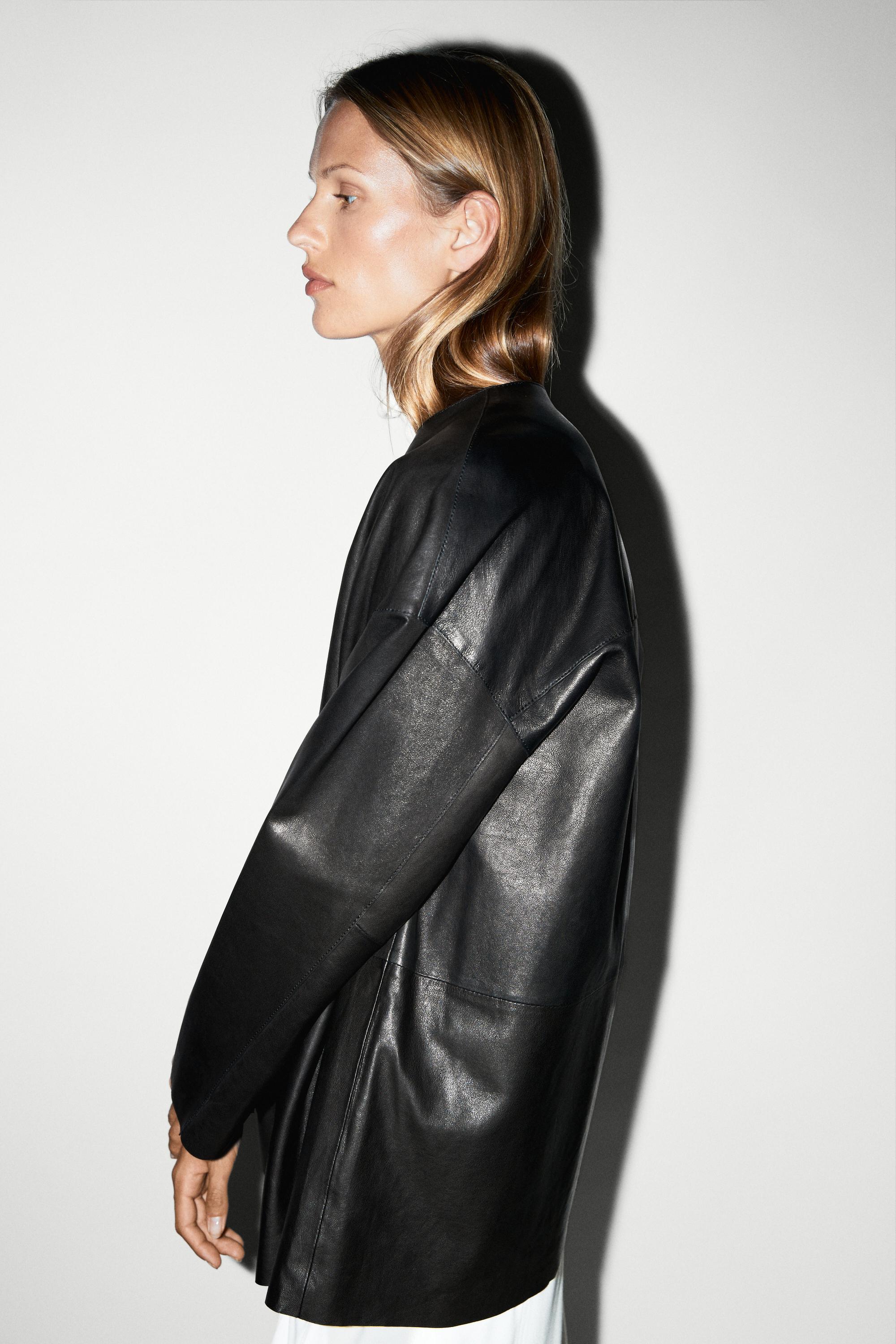Leather jacket with toggle detail