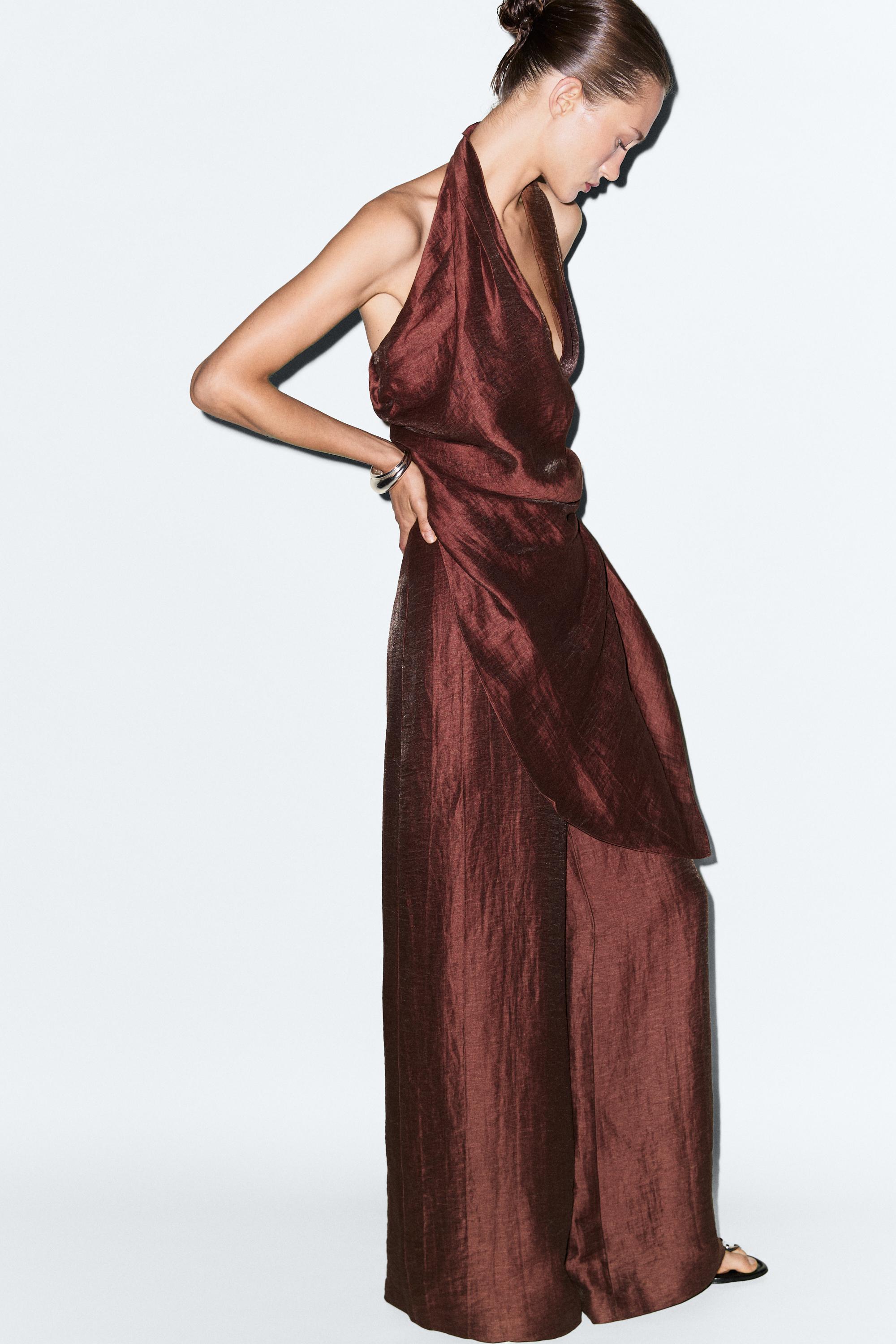 Flowing draped halter neck jumpsuit