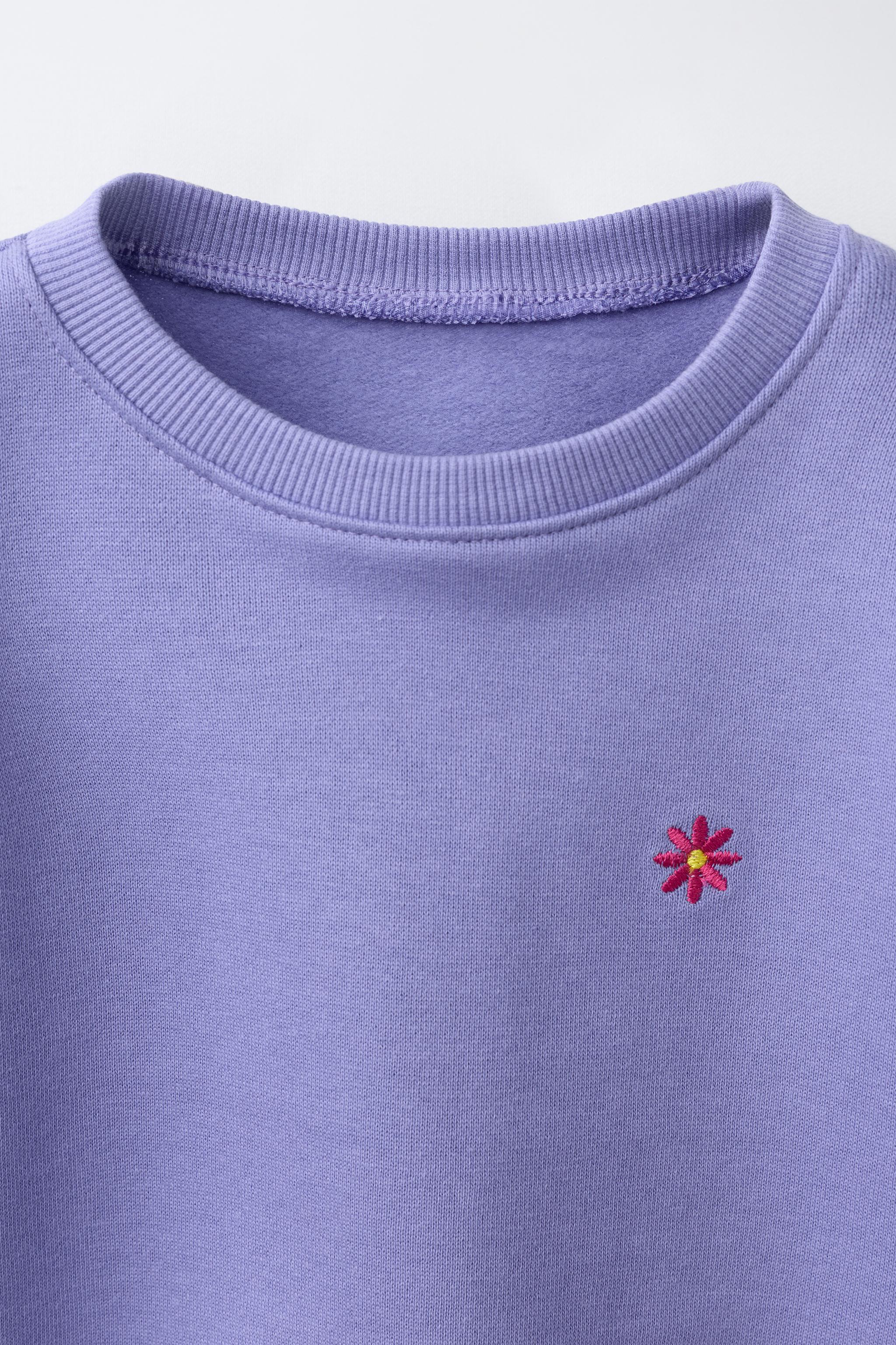 DAISY EMBROIDERED FLEECE SWEATSHIRT