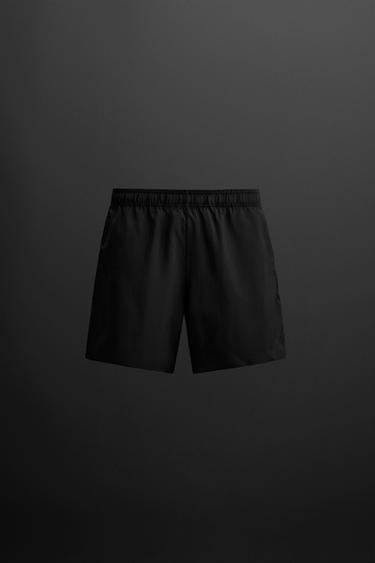 PERFORIERTE TRAININGS-SHORTS - Schwarz von Zara