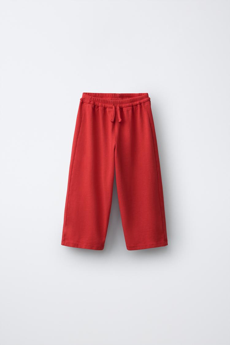 WIDE LEG PUKAS SURF PANTS — Red