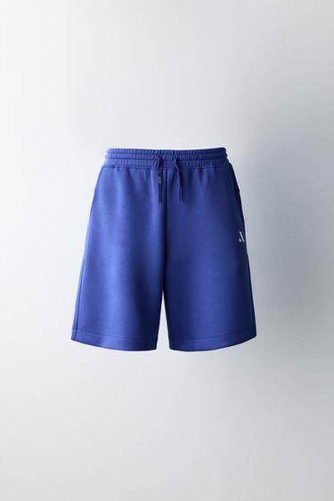 برمودا SPORTY بشعار - بنفسجي الخاص بـ Zara