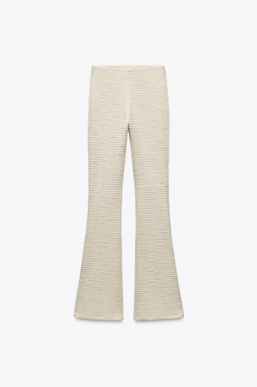 Zara TEXTURED FLARED PANTS - Ecru / Beige
