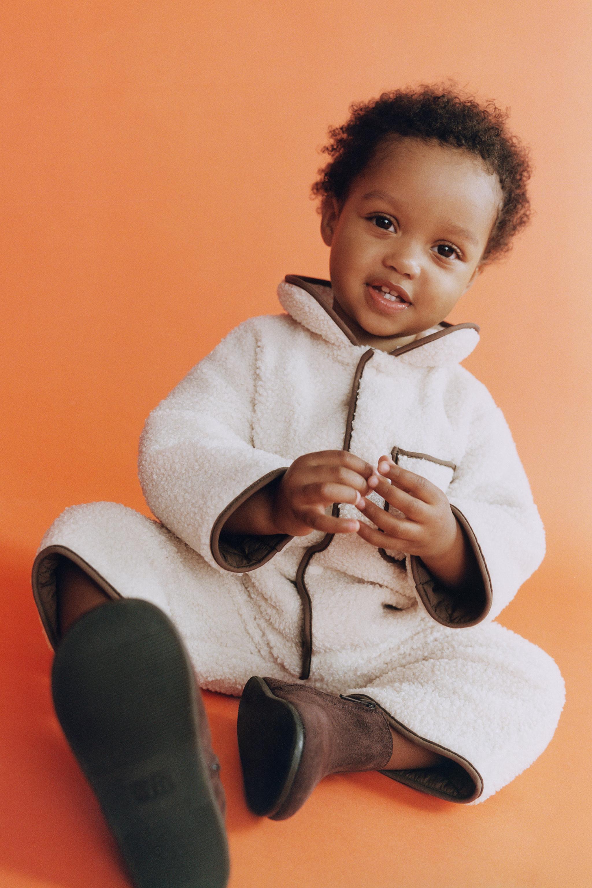 REVERSIBLE SHEARLING AND QUILTED JUMPSUIT