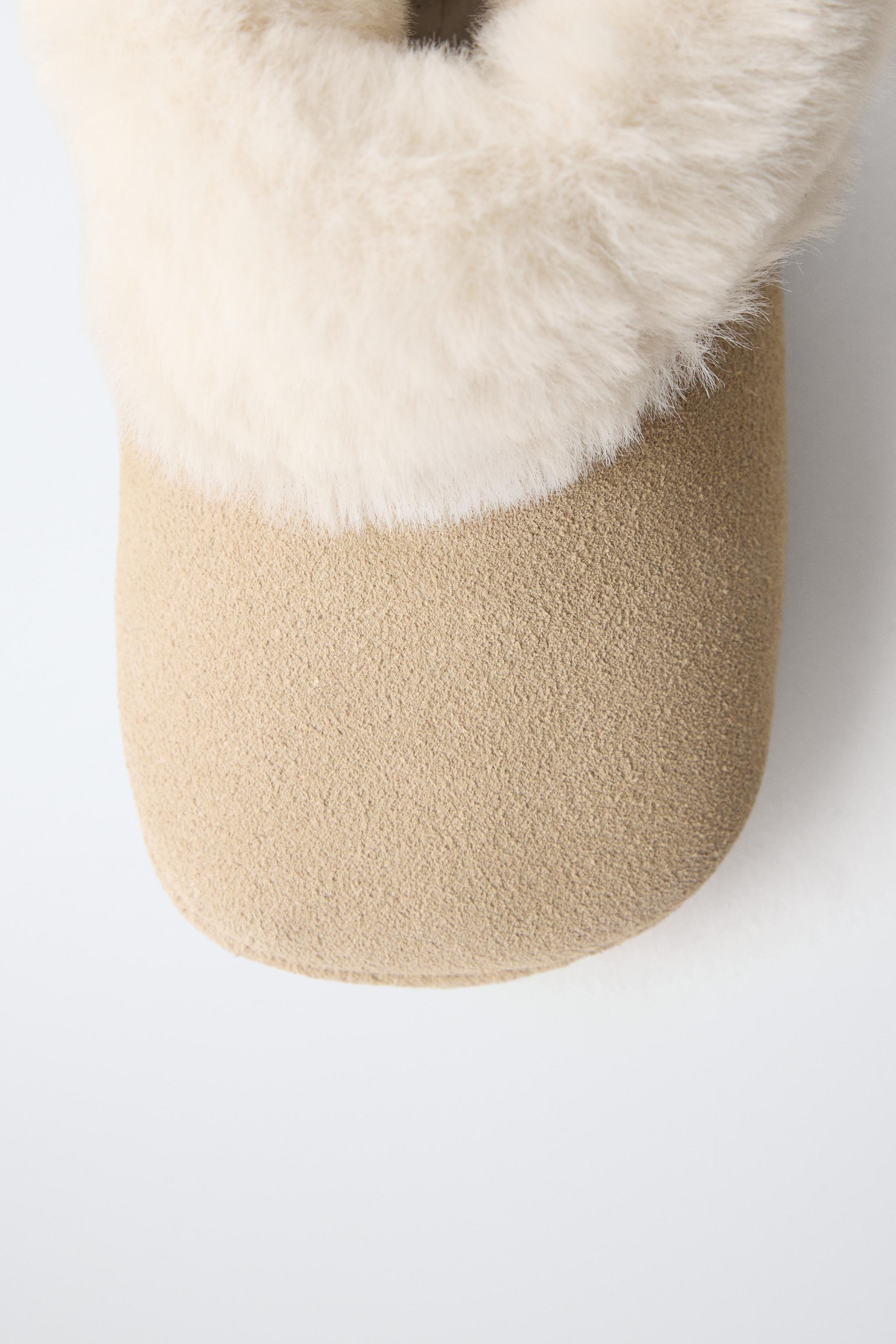 FUR-LINED LEATHER BOOTS