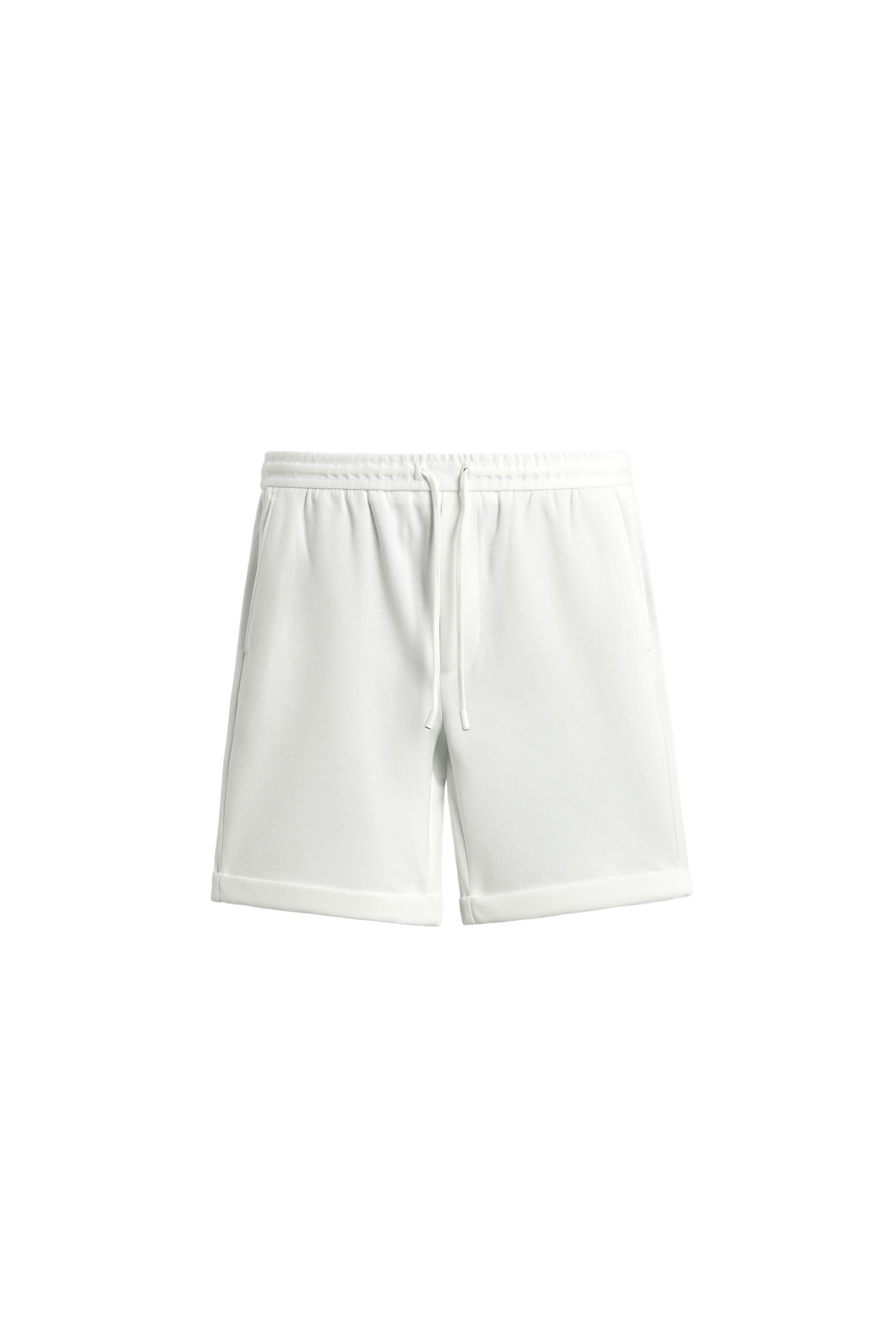 PANTALON FLARE À POIS TAILLE HAUTE - Blanc / Bleu marine