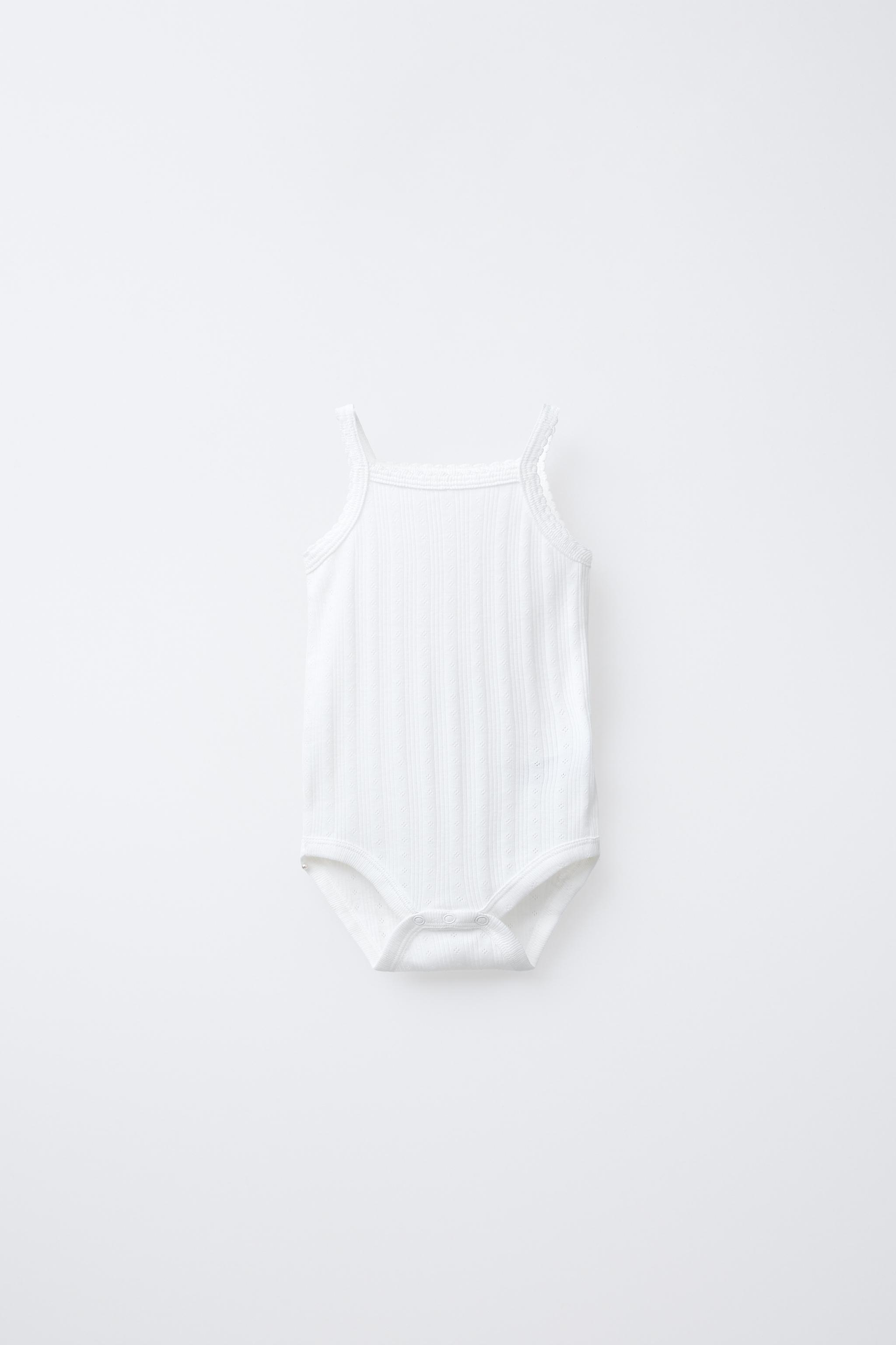 THREE-PACK OF RIB KNIT BODYSUITS WITH CUTOUT DETAIL - Pink