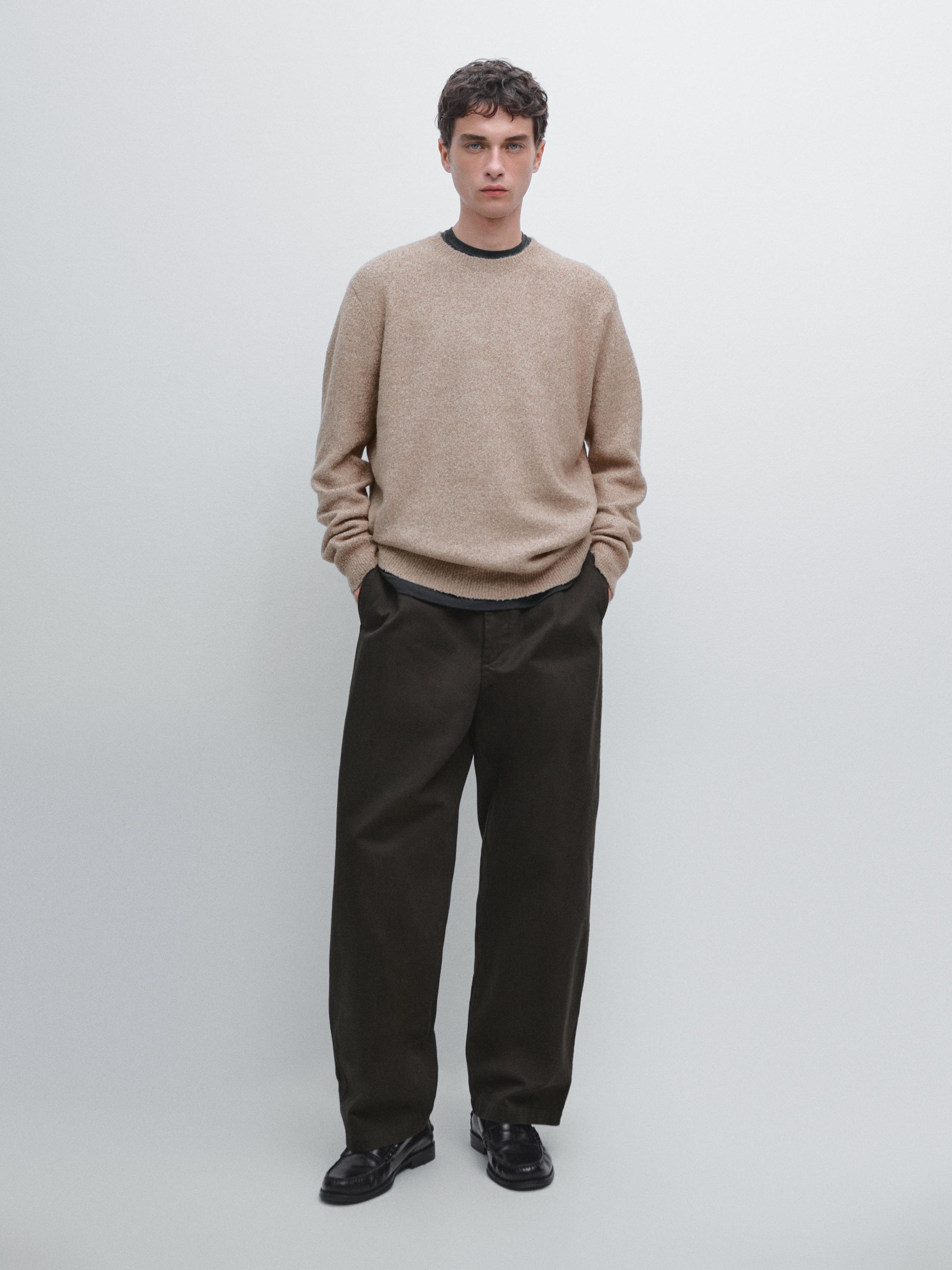 Flecked crew neck knit sweater