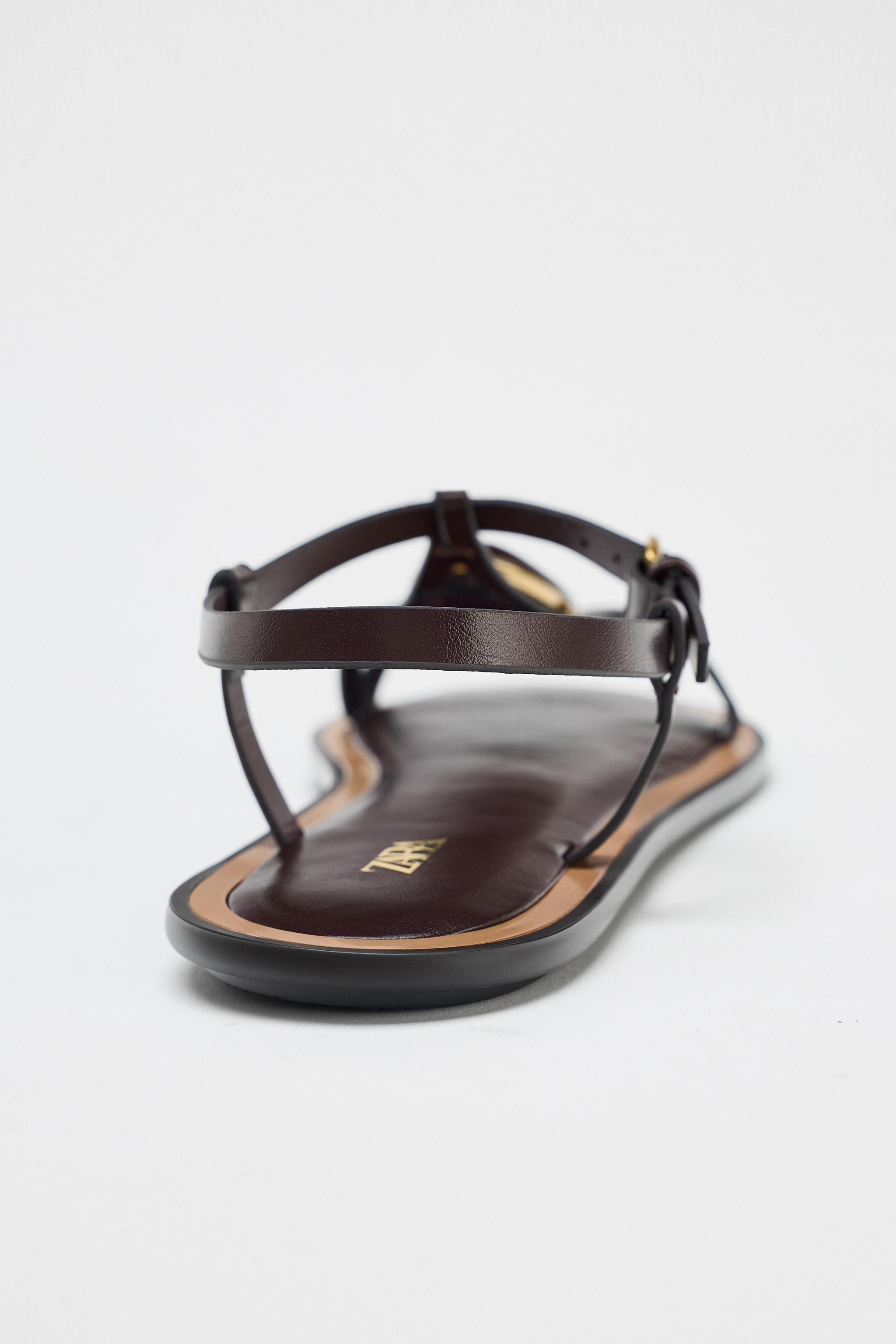 SANDALS WITH METALLIC APPLIQUÉ