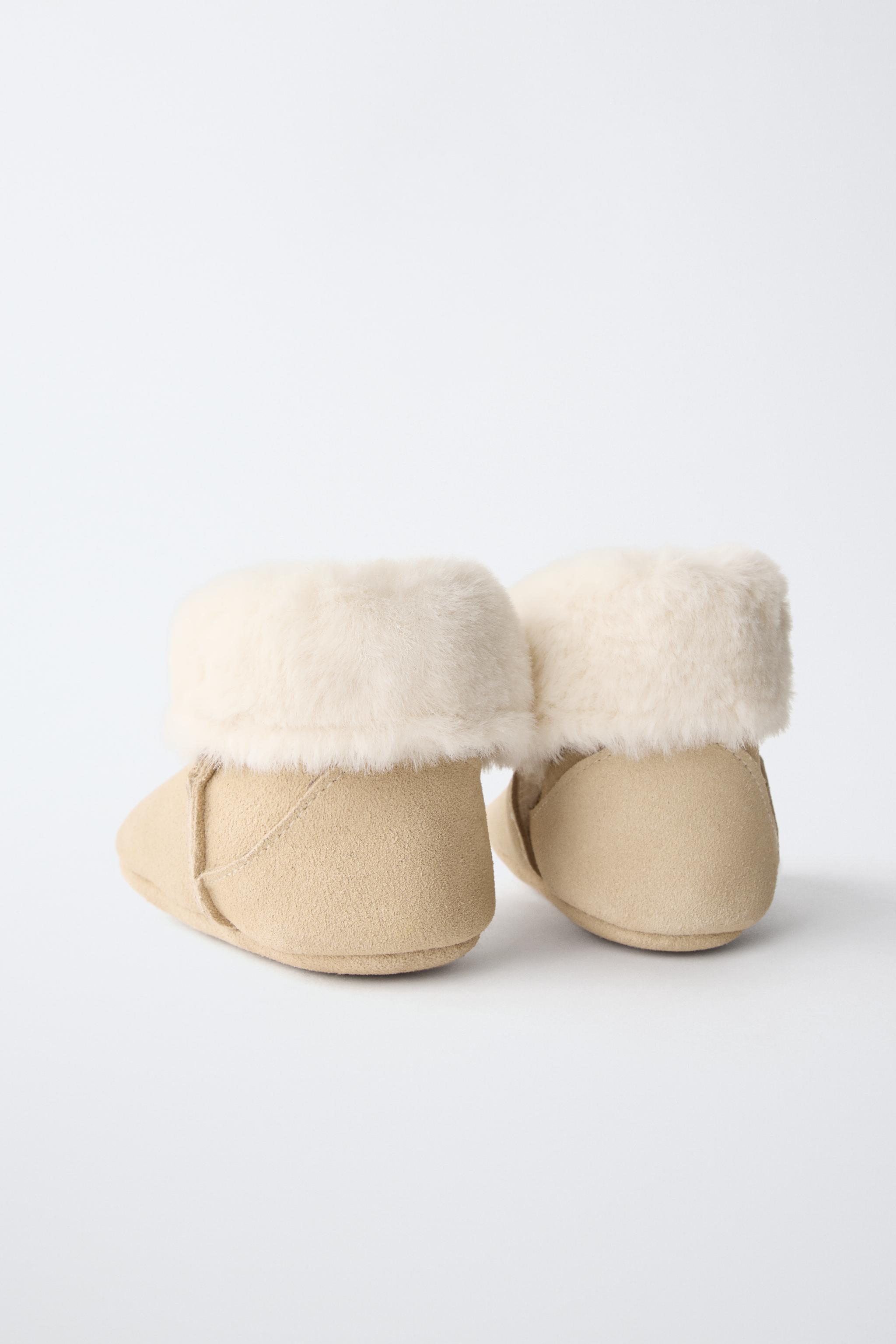FUR-LINED LEATHER BOOTS