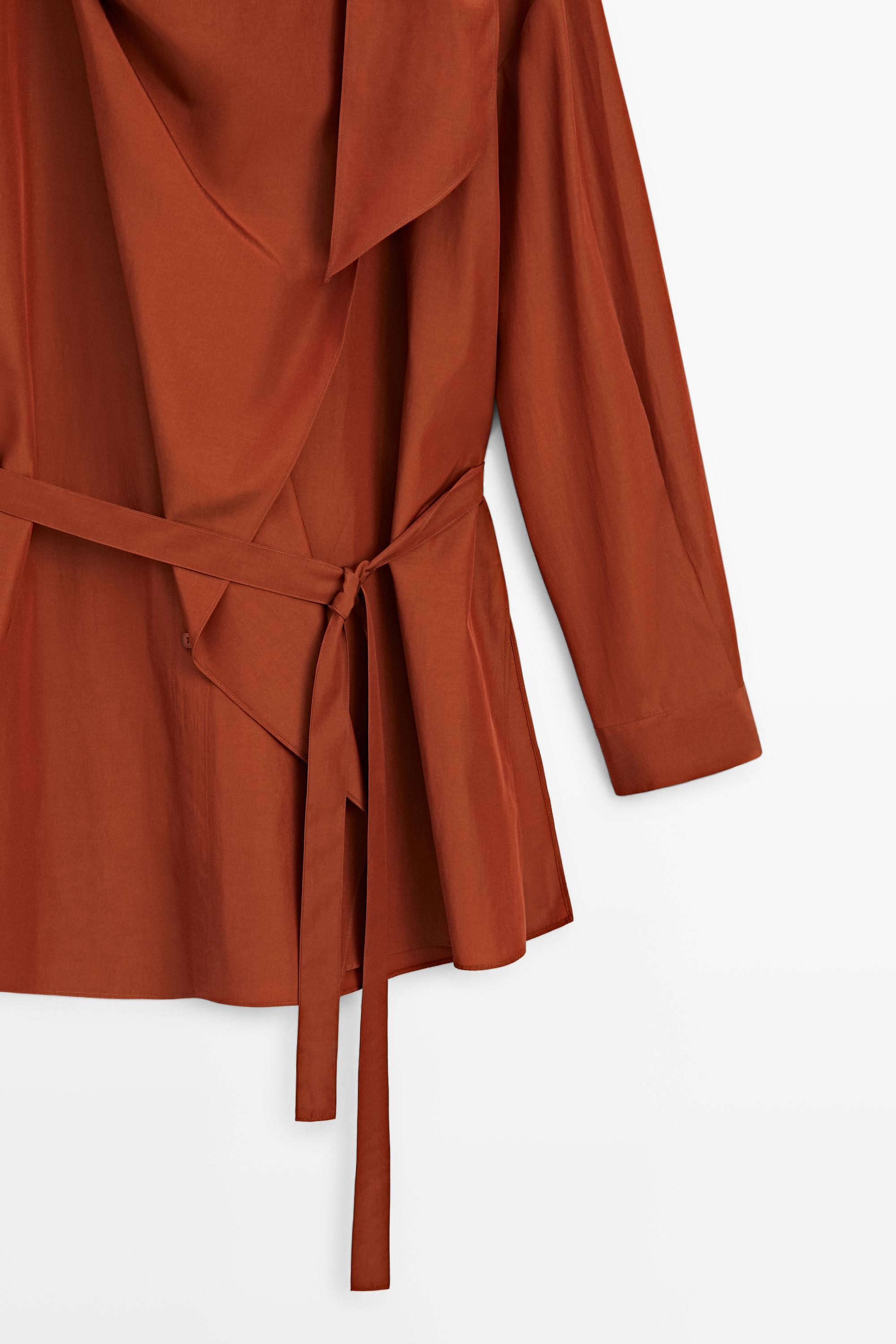 Flowing blouse with tie detail