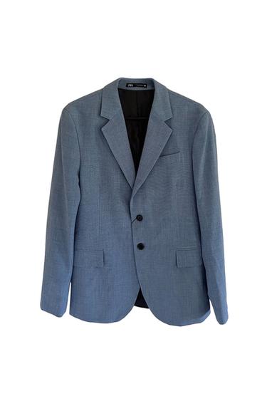 Front view of a blue jacket with lapels, two buttons, and flap pockets.