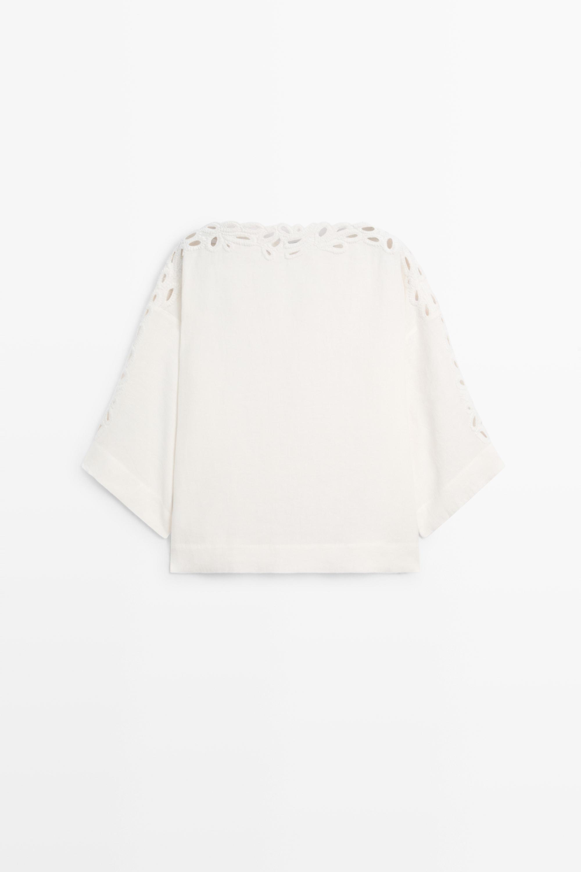 Linen boat neck blouse with embroidery