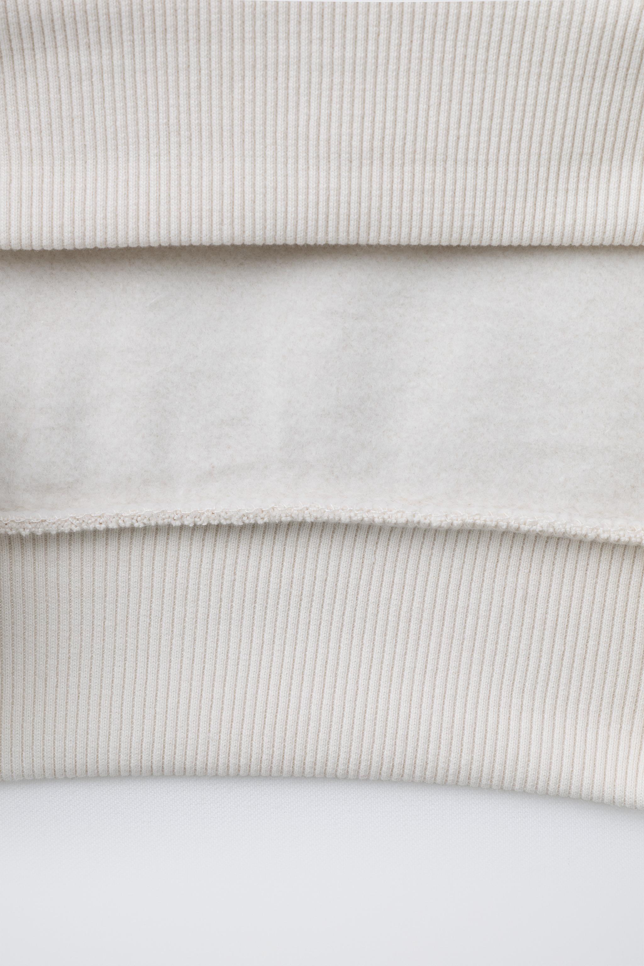 EMBROIDERED TEXT HOODIE