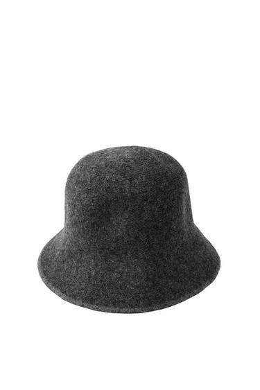 Front view of dark gray felt hat with wide brim.