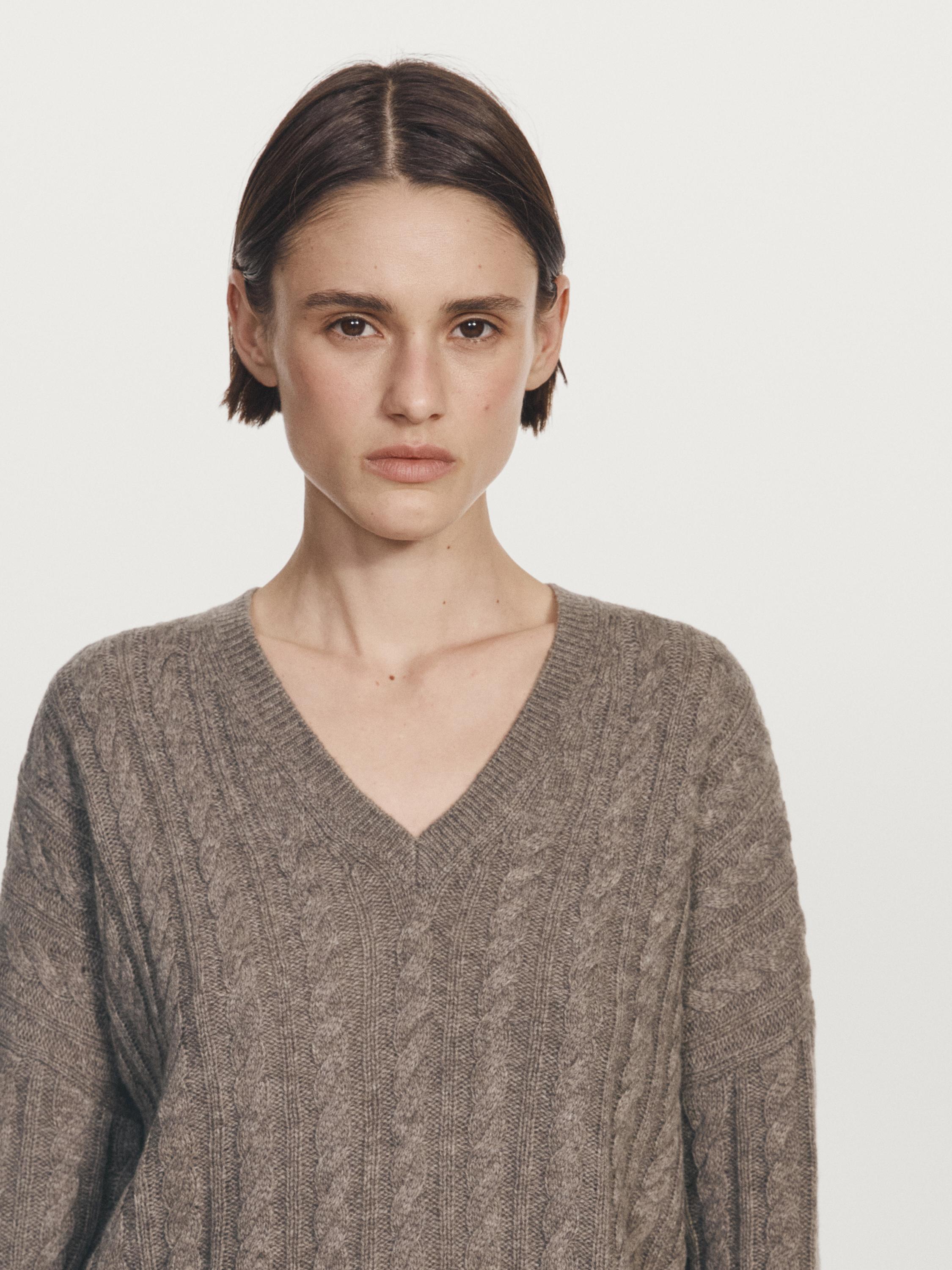 Cable-knit V-neck sweater
