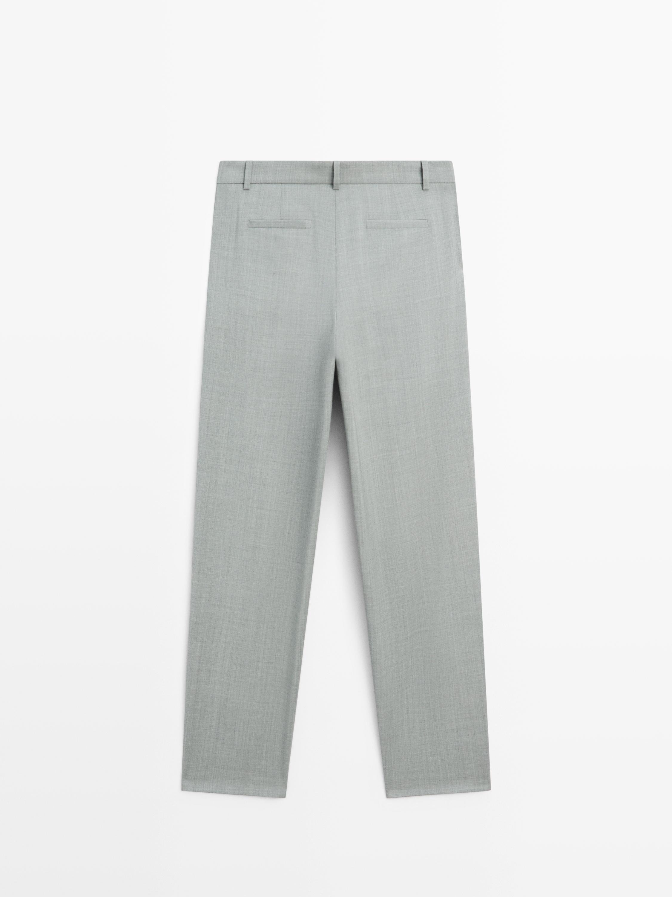 Flowing trousers with darts